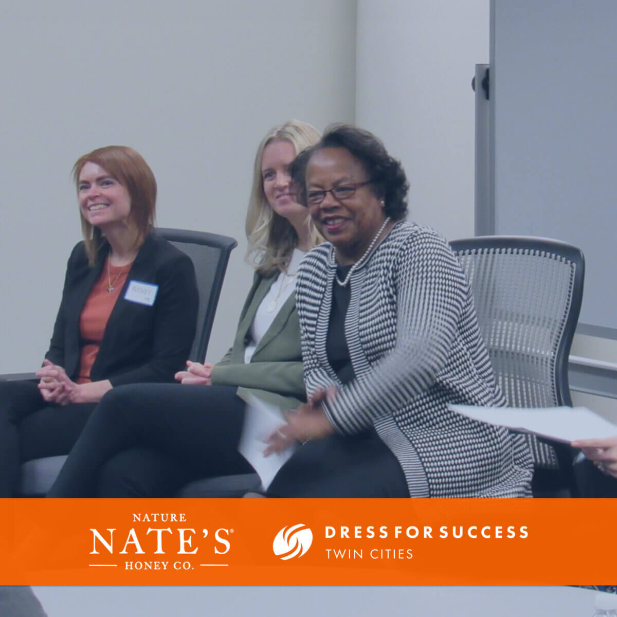 Three women seated in a classroom with text overlay Nature Nate's Honey Co. and Dress for Success Twin Cities.