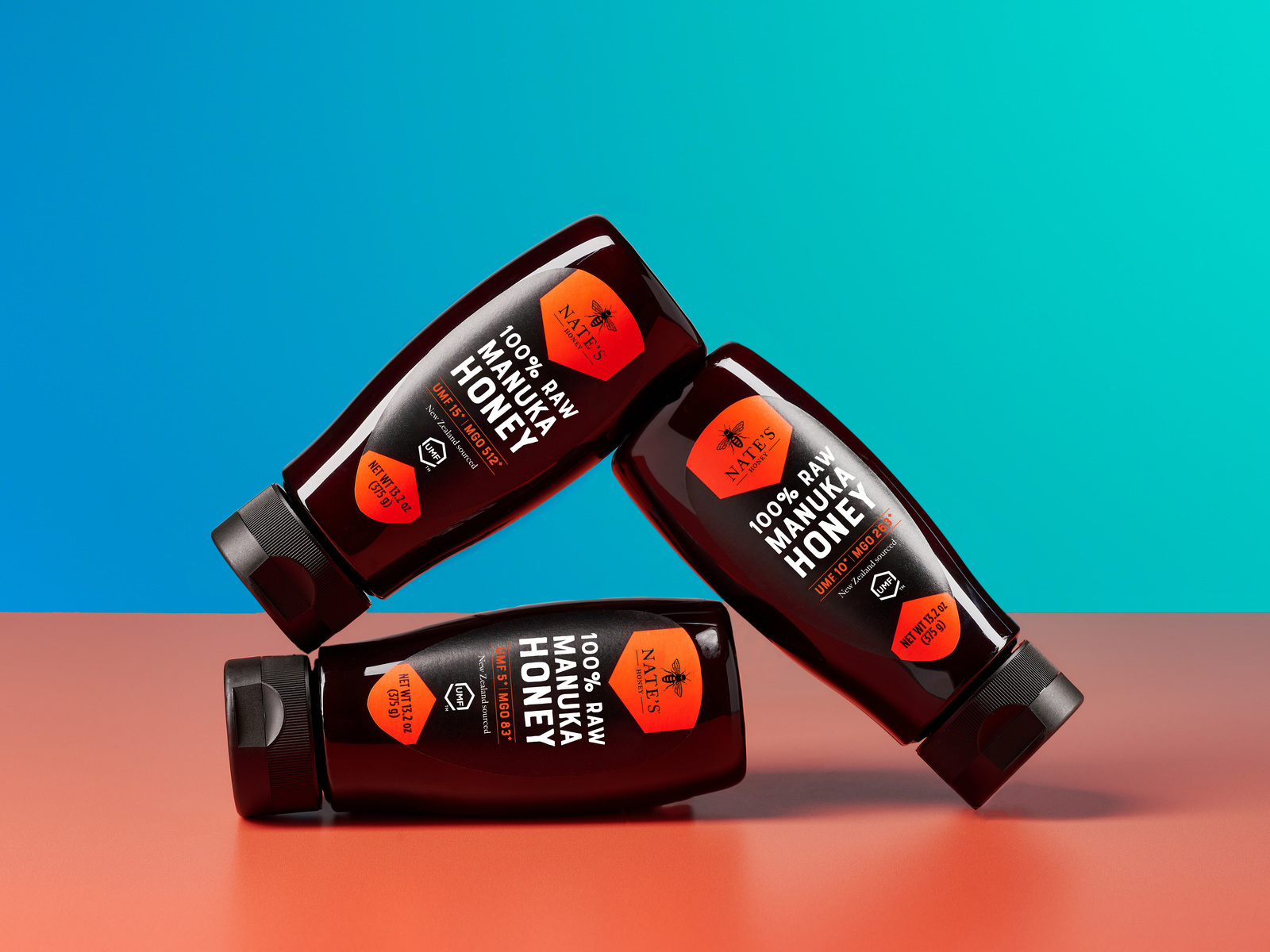 Nate's Manuka honey bottles stacked