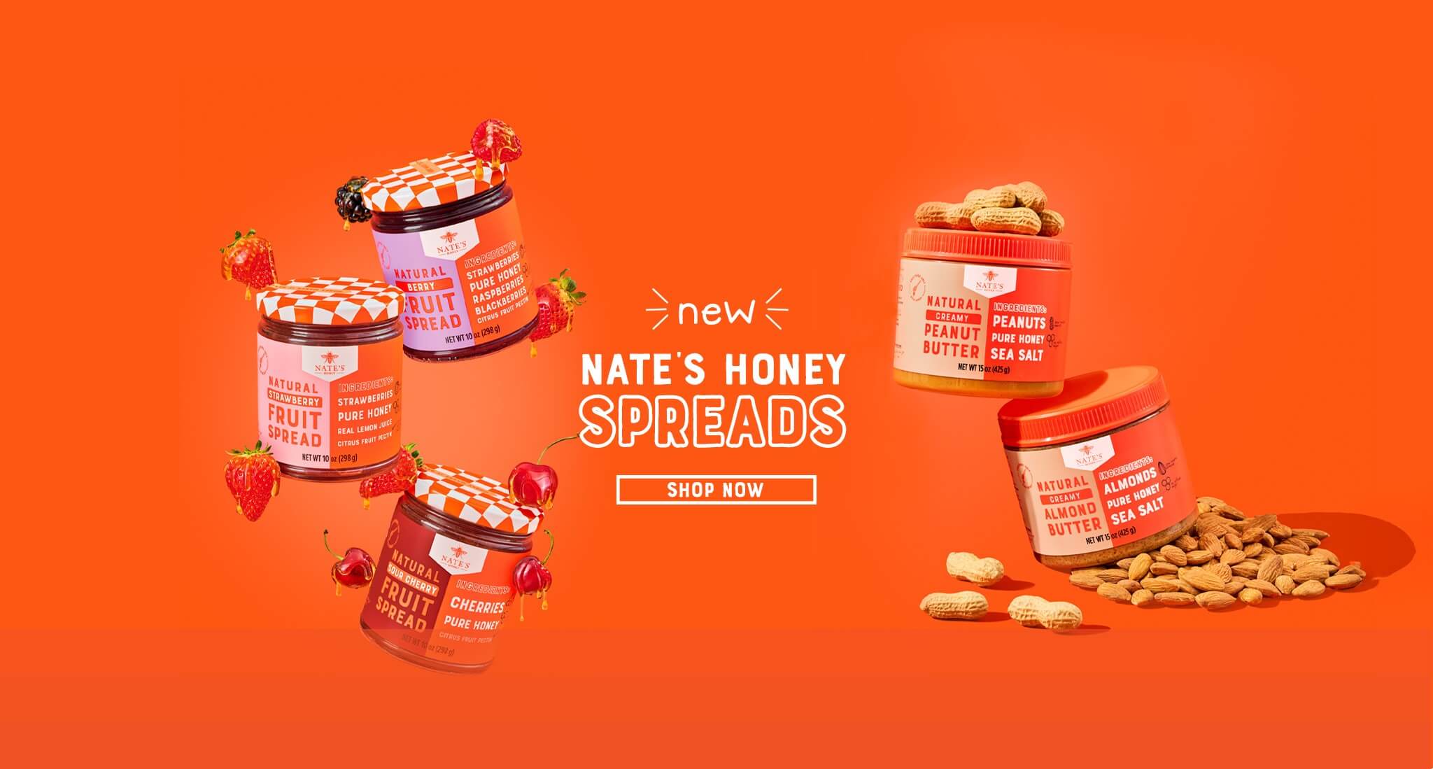 Jars of Nate’s Honey spreads arranged on a bright orange background.