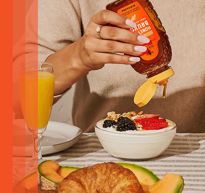 Brunch table spread featuring Vanilla Flavored Honey.